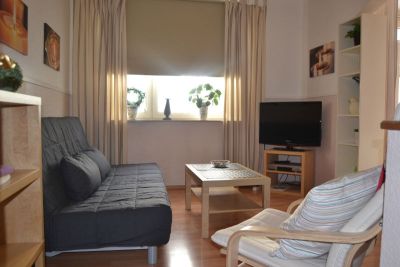 Wohnung 1, Wohnraum mit Schlafsofa